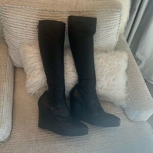 Black platform heeled boots by Ann Demeulemeester
